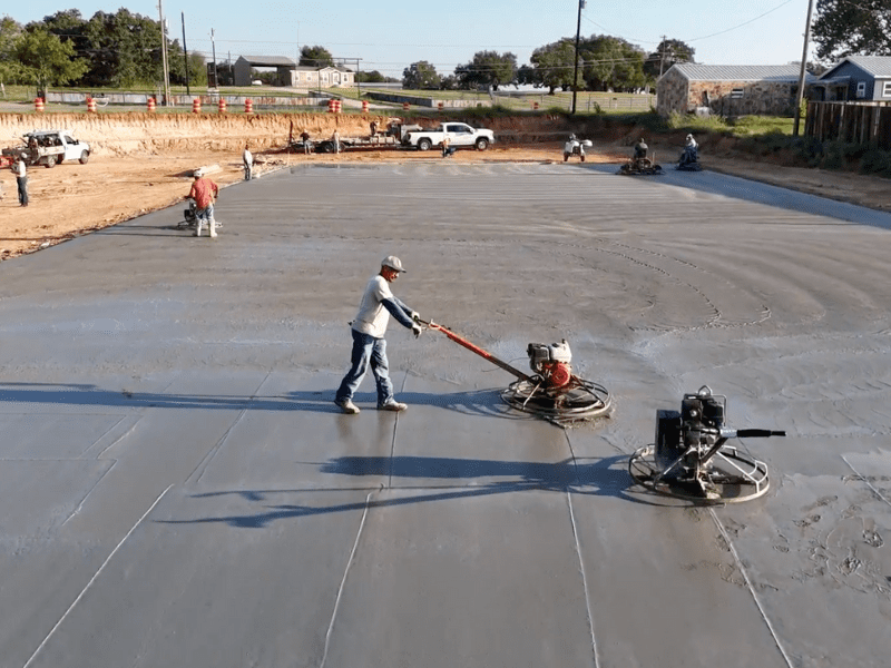 image of men working on working on concrete foundation